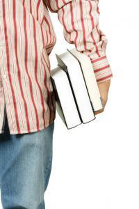 guy carrying books tutor for good