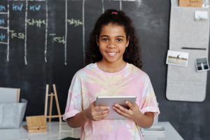 child learning with tablet tutor for good